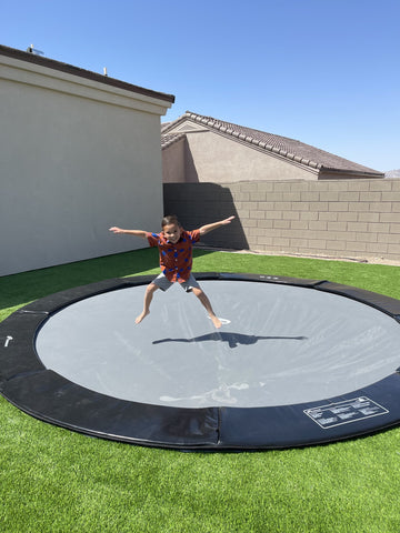 Image of Akrobat 10ft Round Primus Flat In-Ground Trampoline – Black Pad with Gray Jump Mat